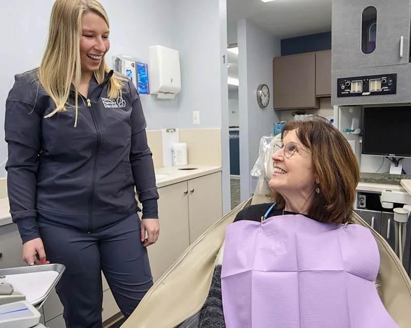 woman getting dental care at Mitten Family Dental